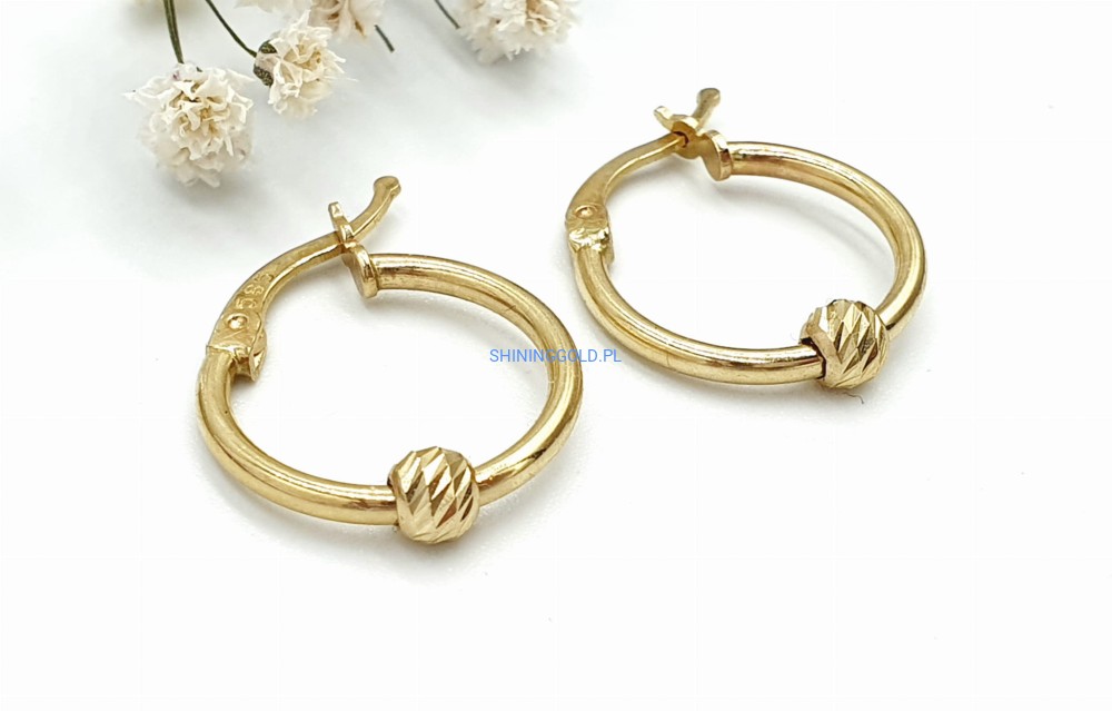 Złote kolczyki (7034.WS)