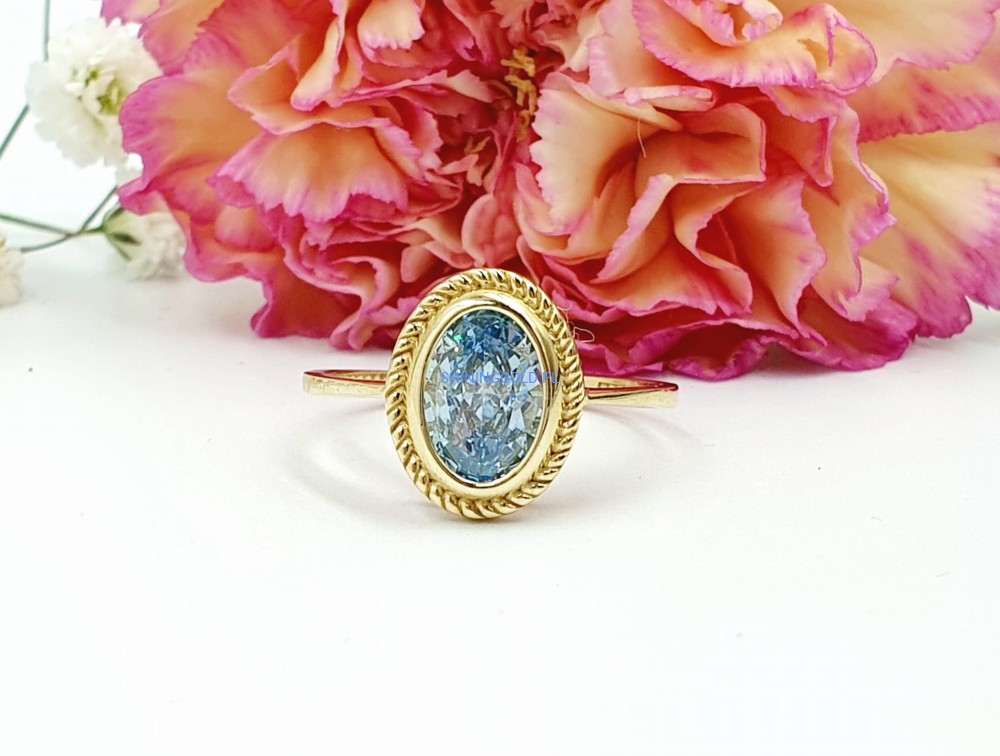 Złoty pierścionek z błękitnym kamieniem(053.WS)