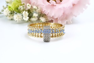 Złoty, nowy pierścionek z kuleczkami i cyrkoniami