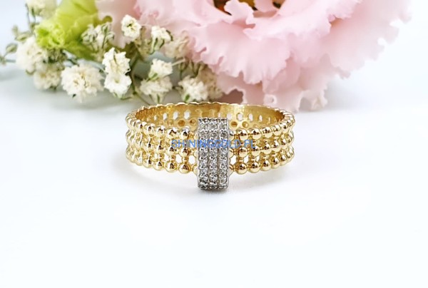 Złoty, nowy pierścionek z kuleczkami i cyrkoniami