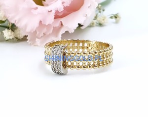 Złoty, nowy pierścionek z kuleczkami i cyrkoniami