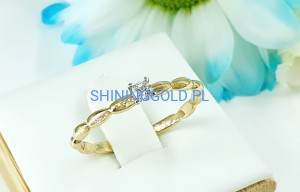 Złoty, nowy pierścionek z cyrkonią